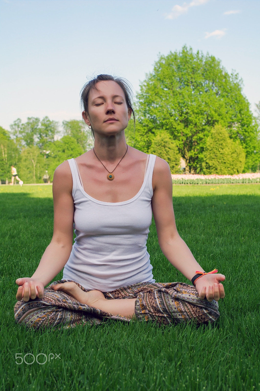 smc PENTAX-DA L 18-55mm F3.5-5.6 sample photo. Young woman sitting in yoga pose meditation outdoors photography