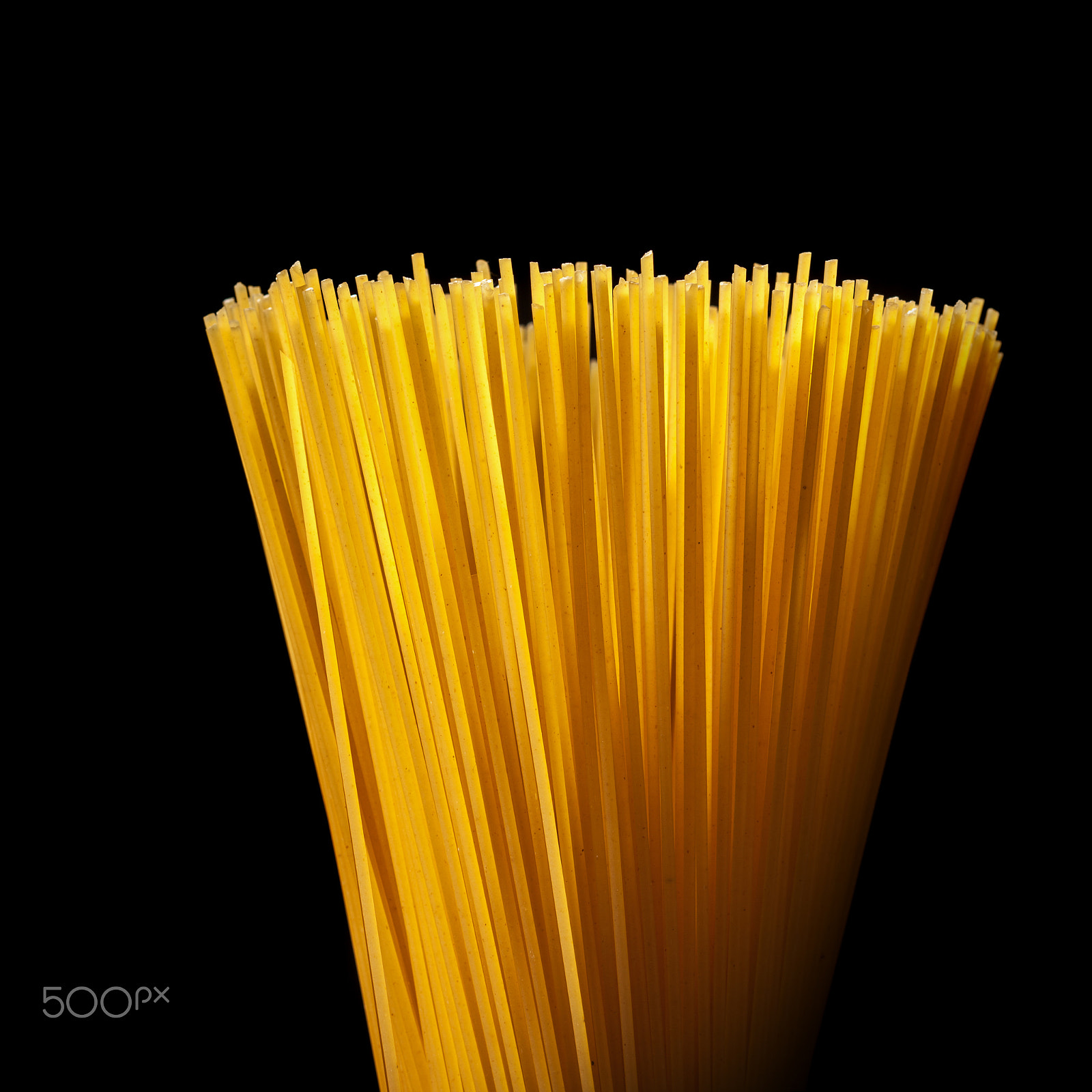 Canon TS-E 90mm F2.8 Tilt-Shift sample photo. Italian spaghetti isolated on black photography