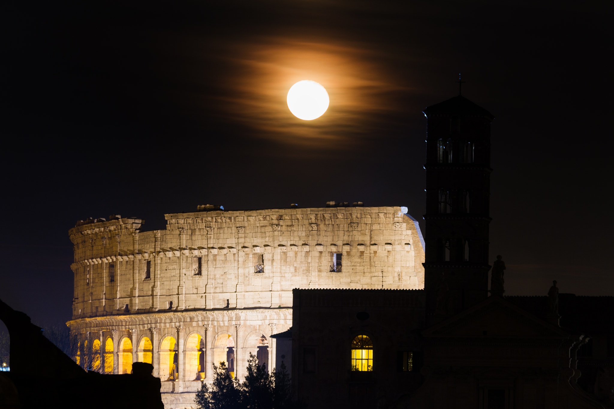 Canon EOS 7D + Canon EF 70-300mm F4.5-5.6 DO IS USM sample photo. Full moon over the coliseum photography