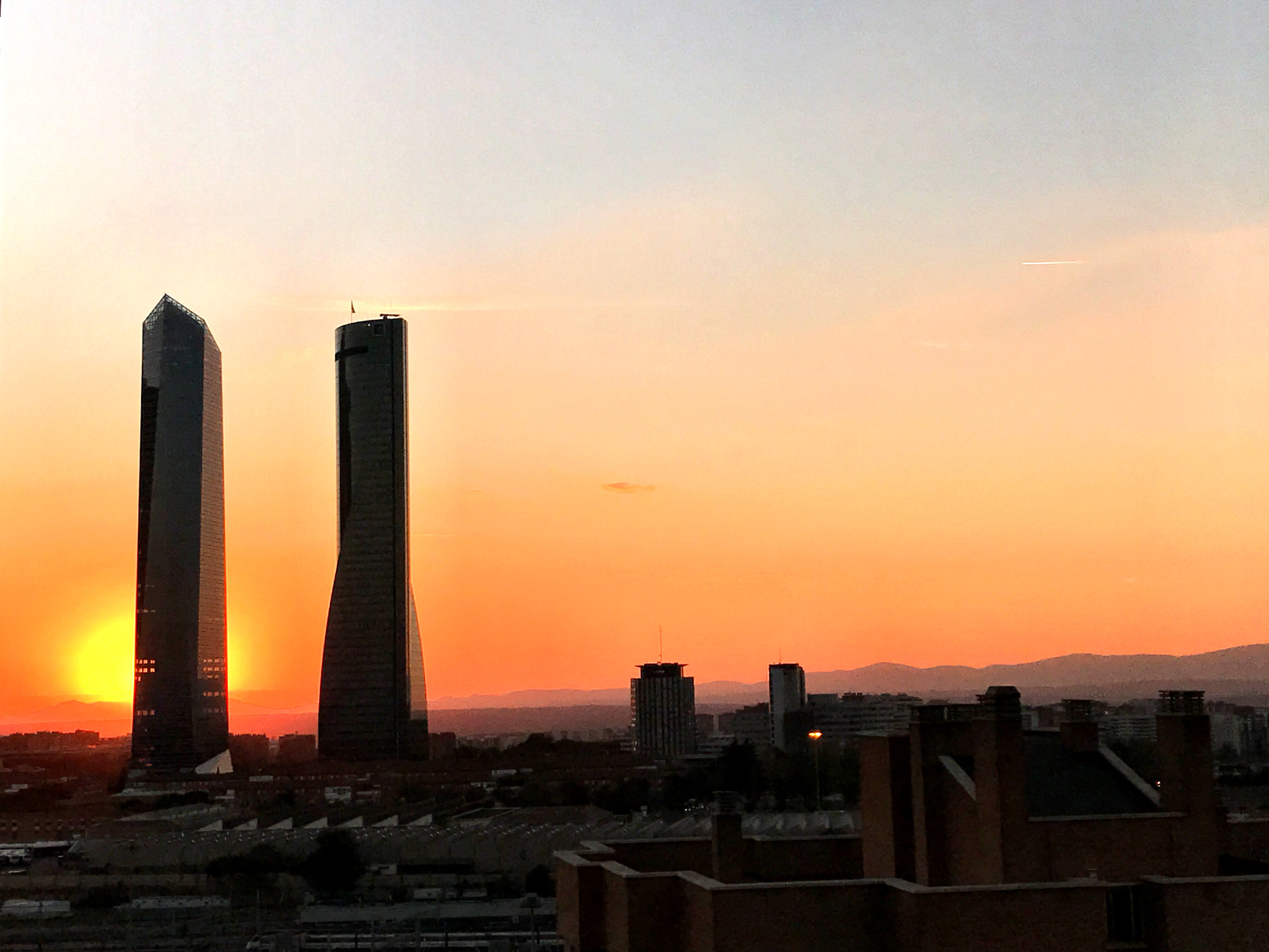 Apple iPhone9,4 sample photo. Madrid towers photography