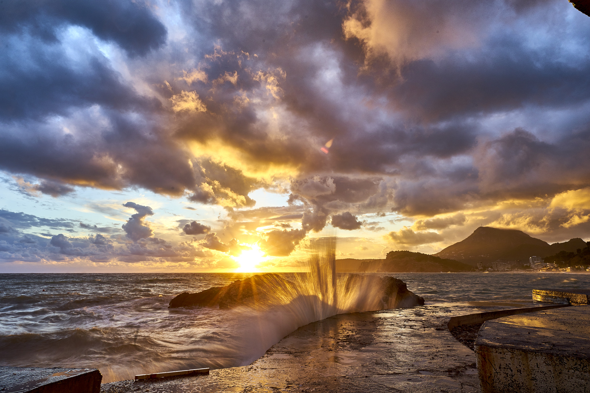 20mm F2.8 sample photo. Sunset splash photography