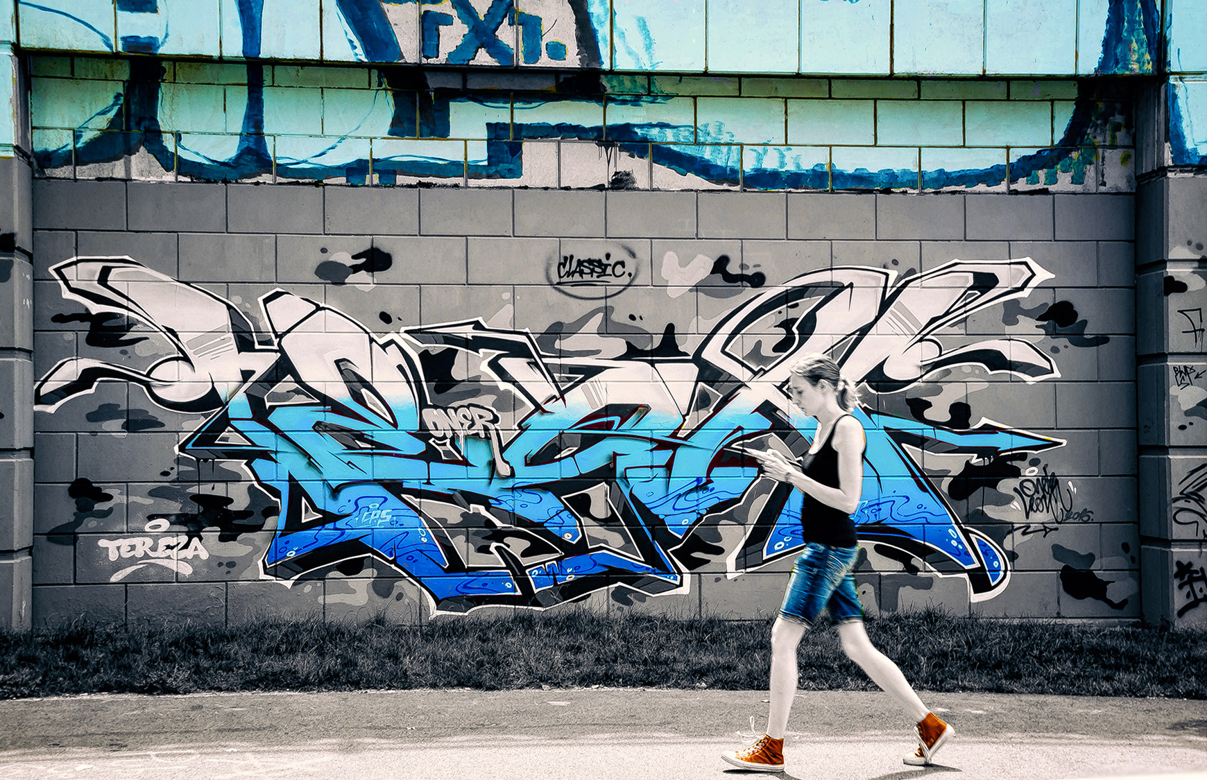 Pentax K-30 sample photo. Getting the blues a doodle and orange sneakersfotoblur photography