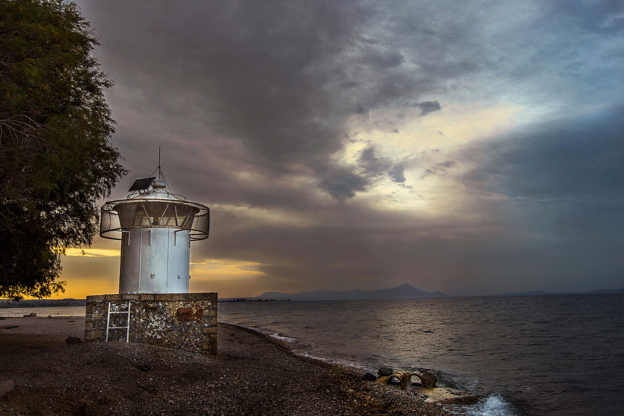 Tokina AT-X 16-28mm F2.8 Pro FX sample photo. The lighthouse in oropos photography