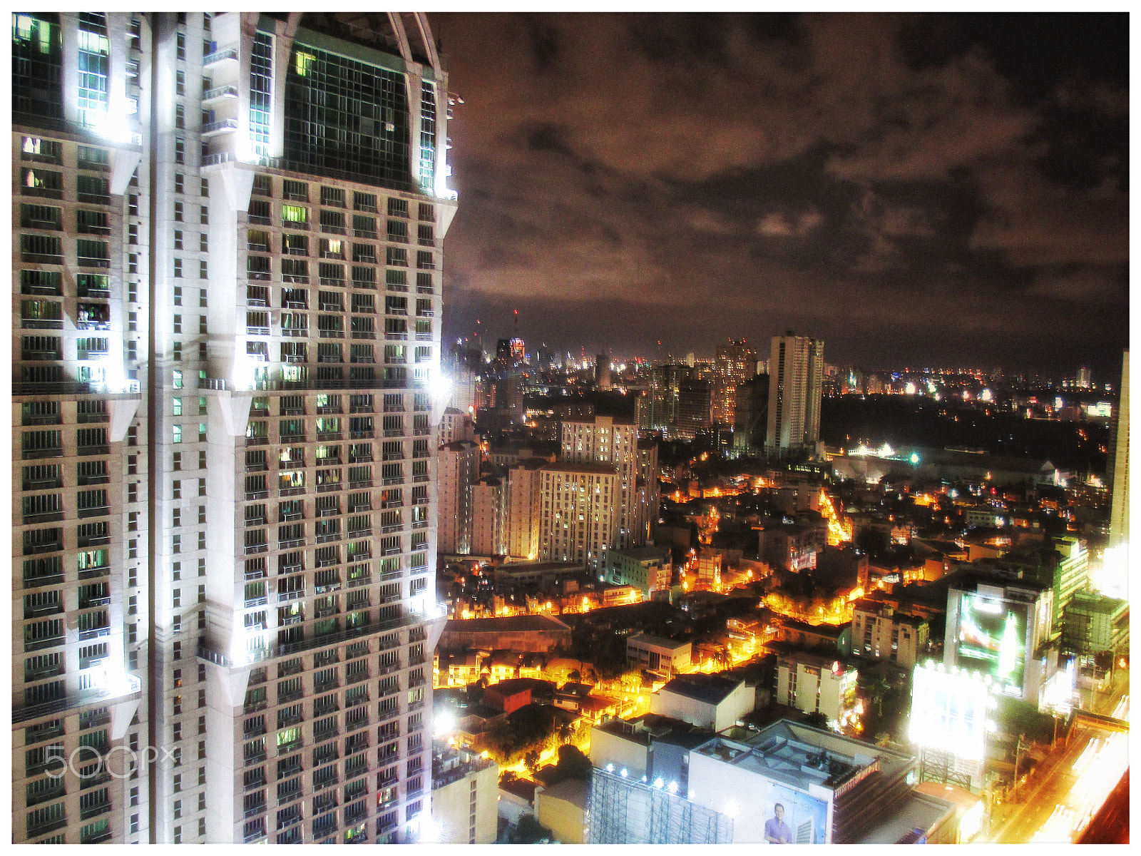 Canon PowerShot ELPH 135 (IXUS 145 / IXY 120) sample photo. Metro manila by night photography