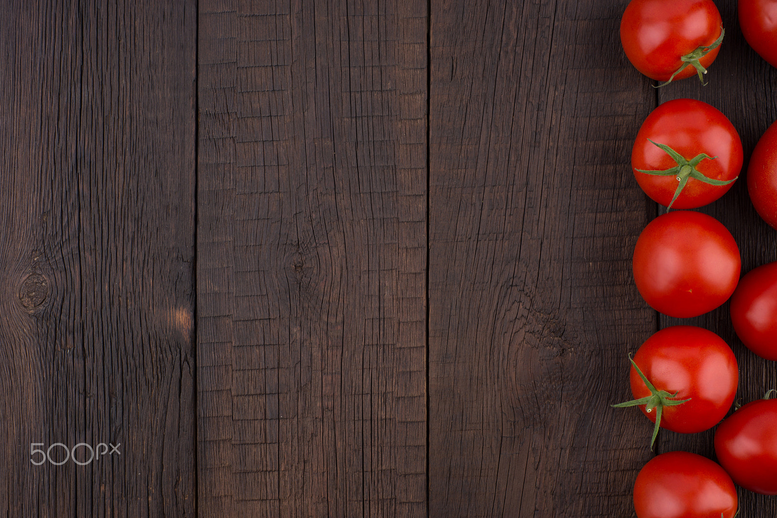 Sony a99 II sample photo. Fresh tomatoes on rustic wooden background. photography