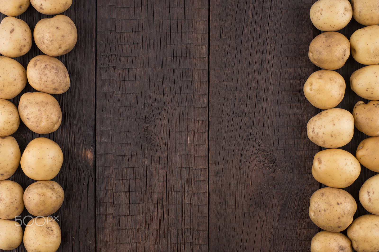 Sony a99 II sample photo. Potatoes on rustic wooden background. photography