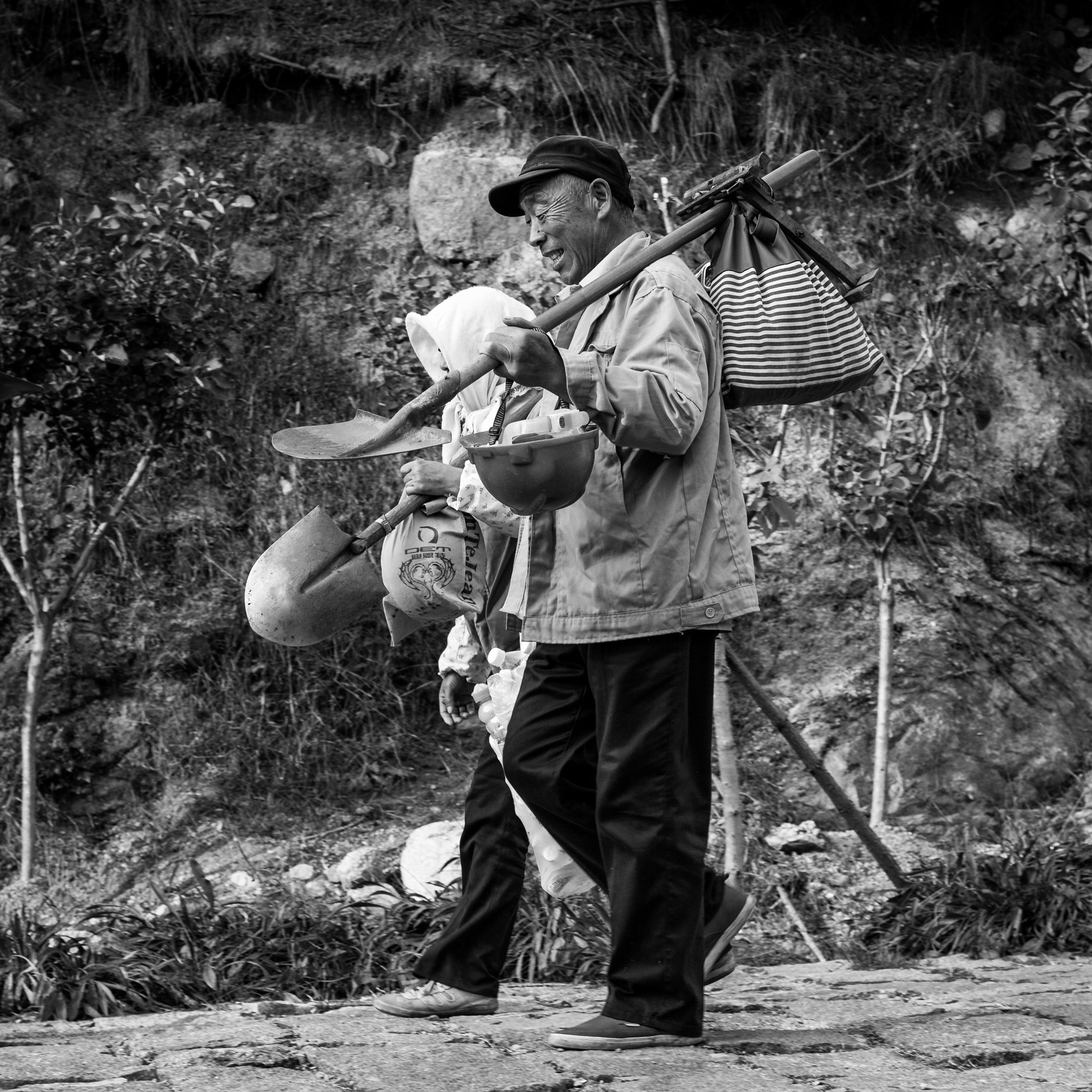 Canon EOS 100D (EOS Rebel SL1 / EOS Kiss X7) + Canon EF 50mm F1.4 USM sample photo. Hard workers happiness photography