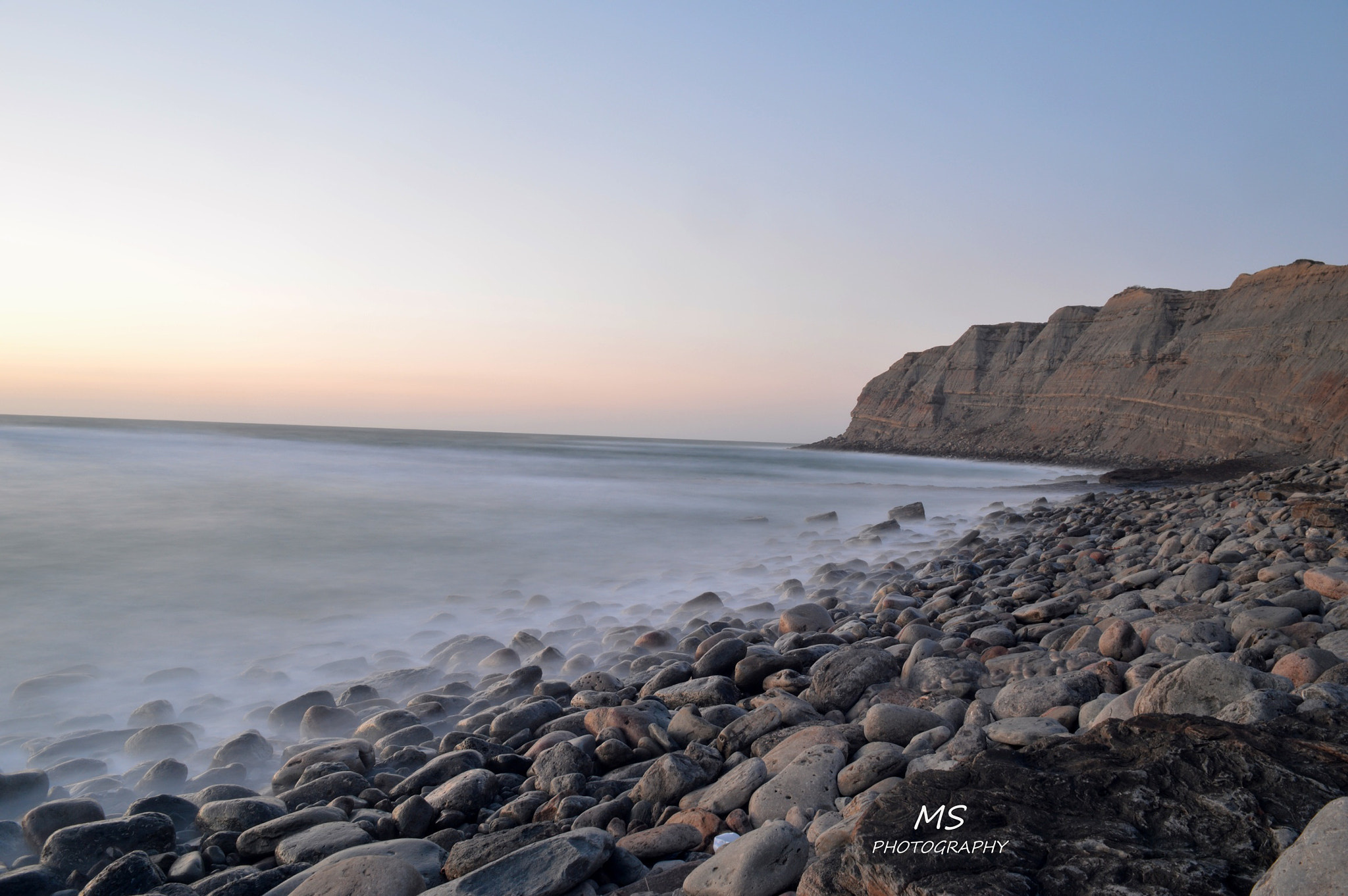 Nikon AF DX Fisheye-Nikkor 10.5mm F2.8G ED sample photo. Blue sea, blue beach  photography