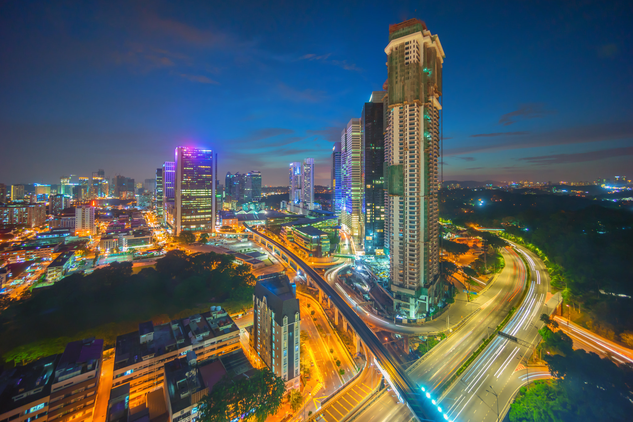 Sony a7R + Sony E 10-18mm F4 OSS sample photo. Majestic sunset sky over kuala lumpur downtown photography