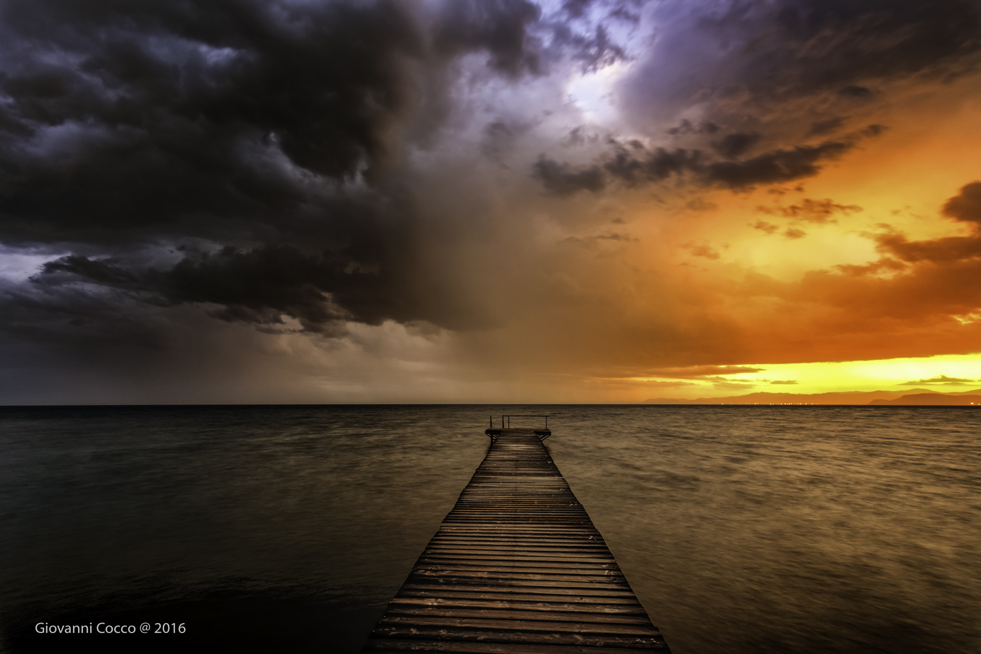 Nikon D810 + Tokina AT-X 17-35mm F4 Pro FX sample photo. Two colors stormy sunset photography