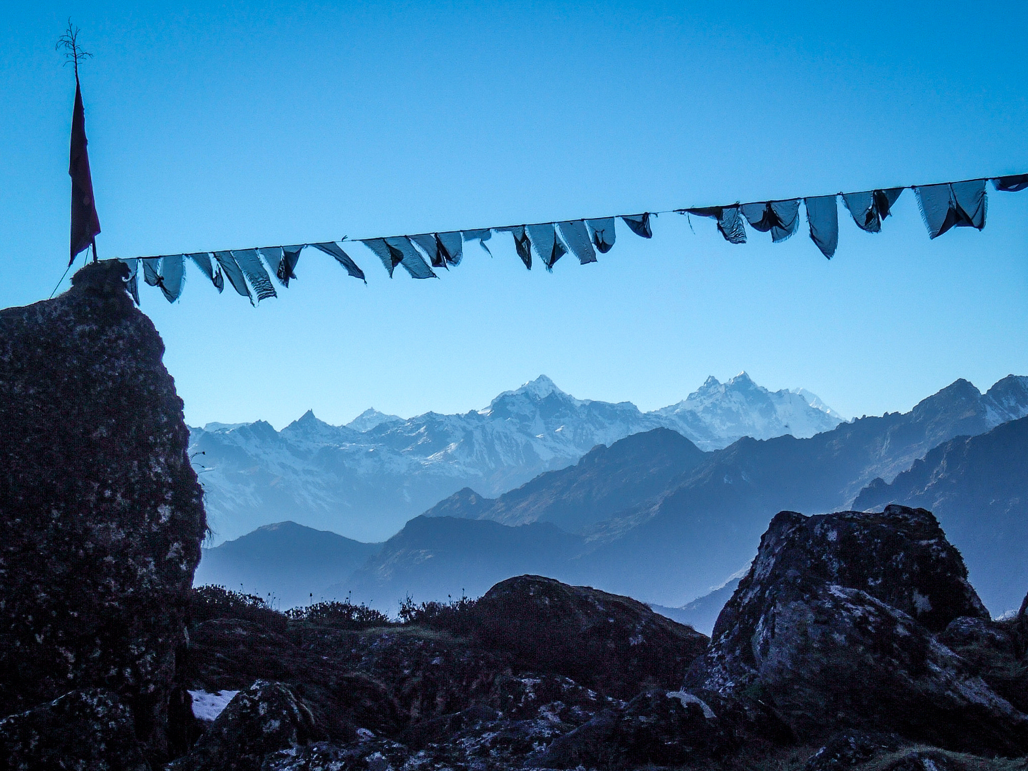 Fujifilm FinePix F10 sample photo. Windswept prayer flags photography