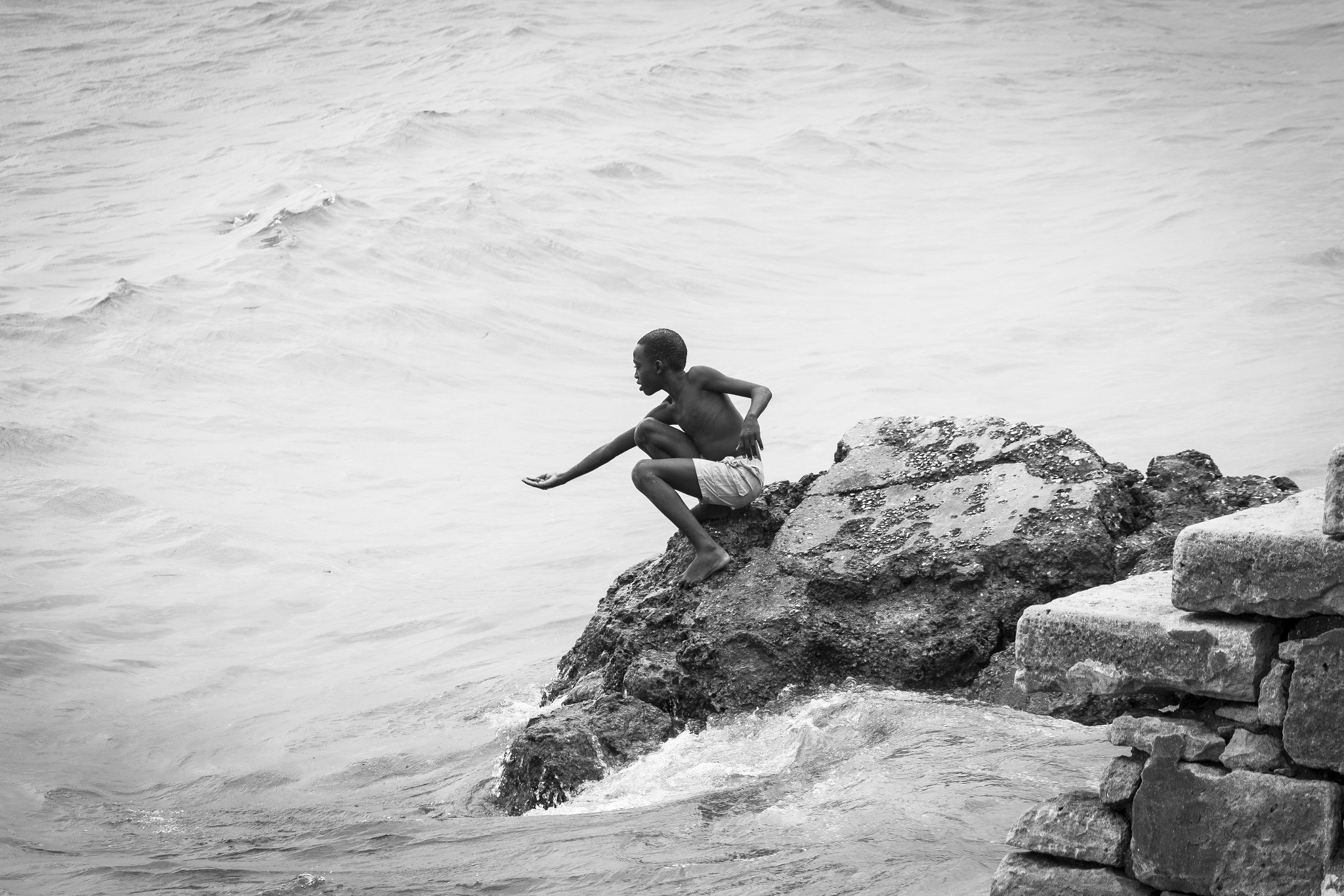 Canon EF-S 55-250mm F4-5.6 IS sample photo. Playing boy, zanzibar photography