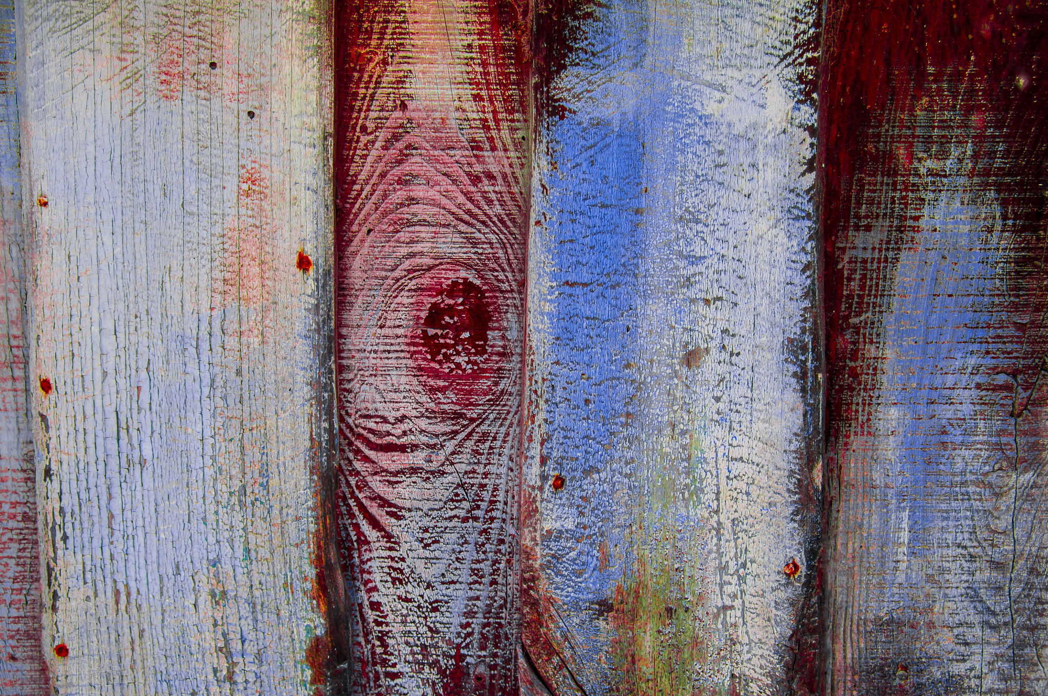 Nikon D90 sample photo. Aging pink and red wooden fence photography