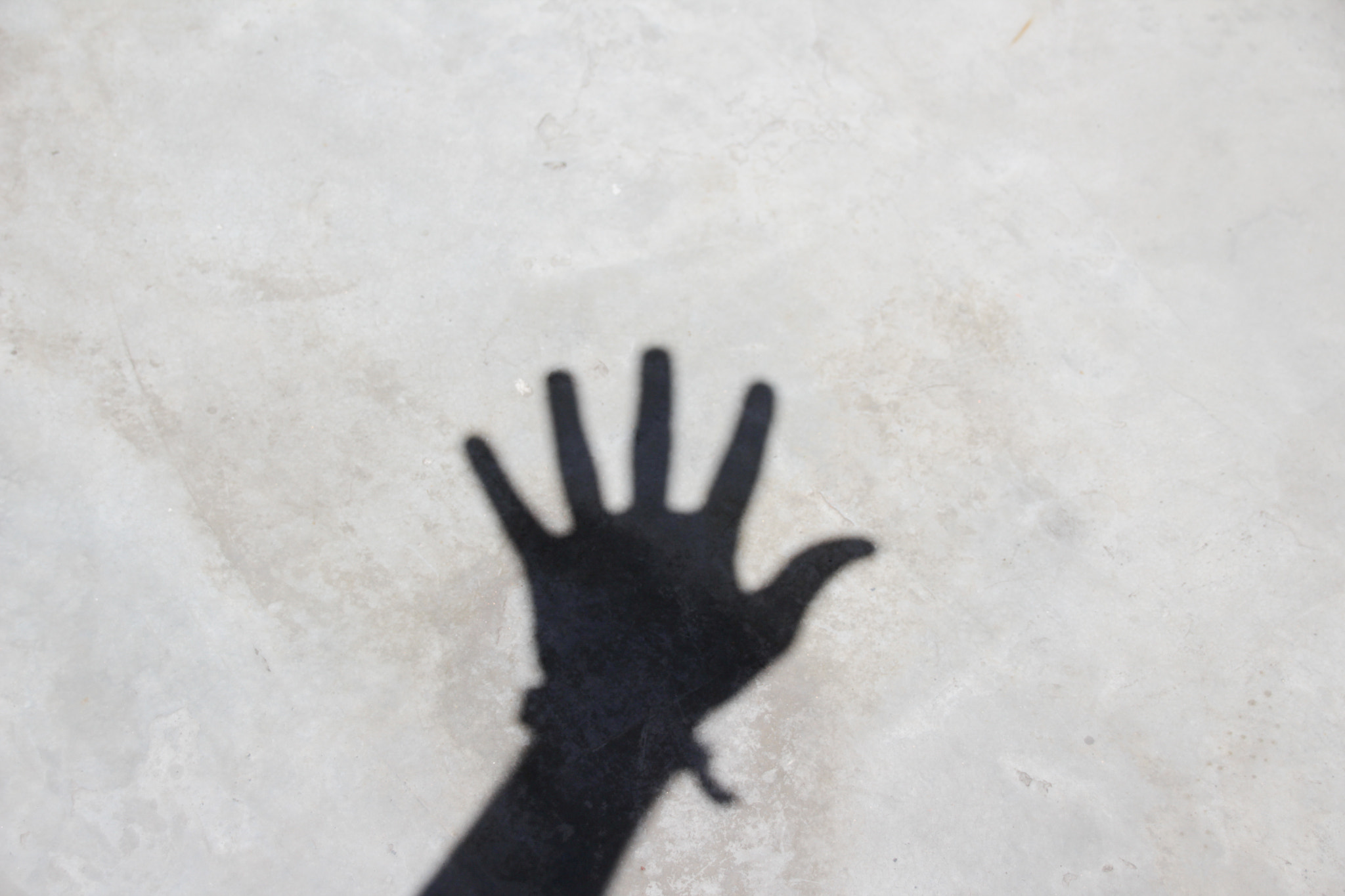 Sigma 18-250mm F3.5-6.3 DC OS HSM sample photo. Open hand shadow on floor photography