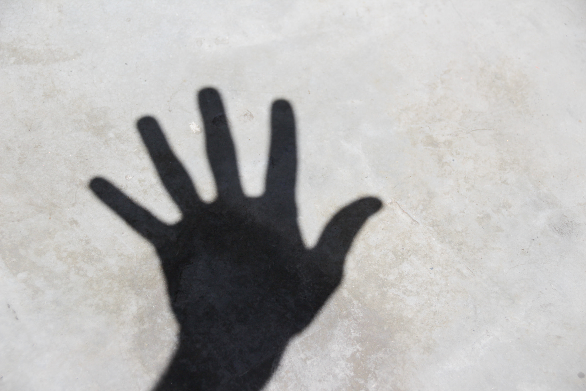 Sigma 18-250mm F3.5-6.3 DC OS HSM sample photo. Open hand shadow on floor photography