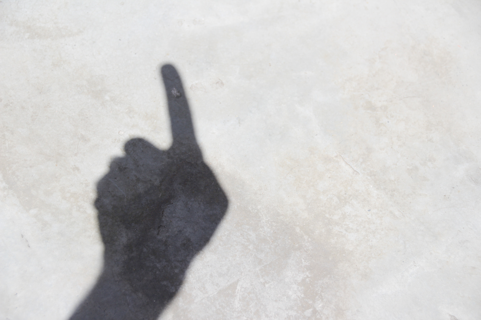 Sigma 18-250mm F3.5-6.3 DC OS HSM sample photo. Human hand shadow on floor photography