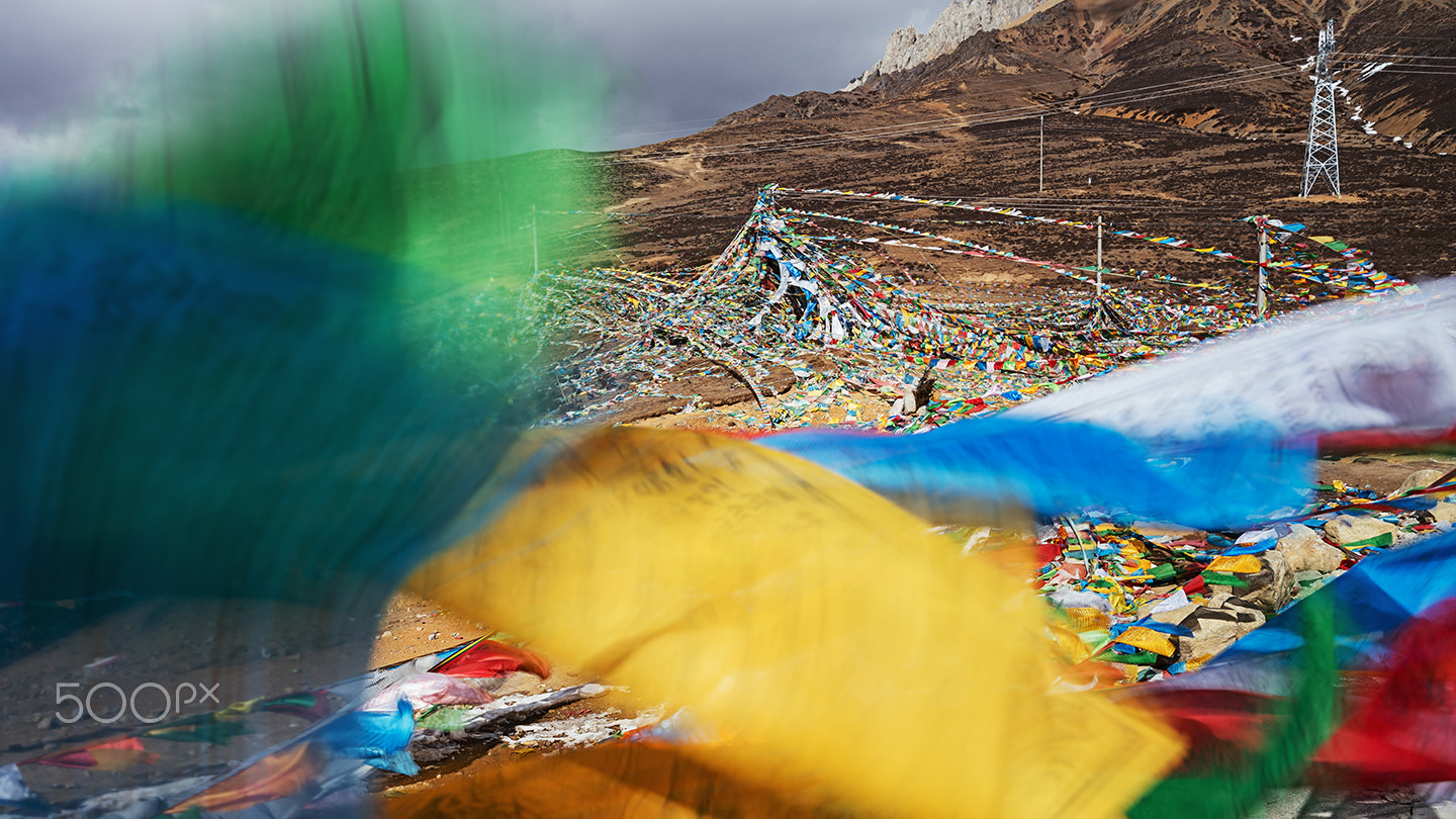 Sony a99 II sample photo. The praying flags on the pass in tibet photography