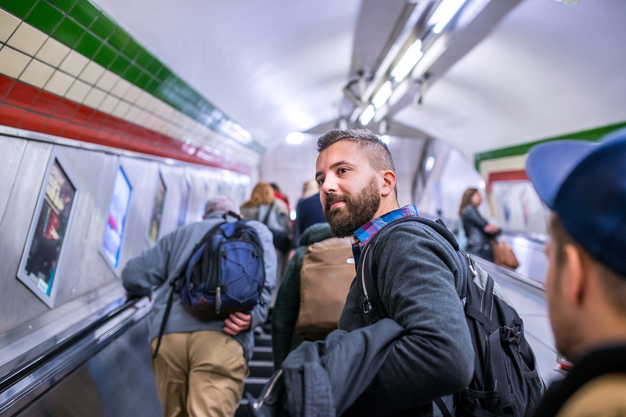 Nikon D4S + Sigma 35mm F1.4 DG HSM Art sample photo. Hipster man standing at the escalator in london subway photography