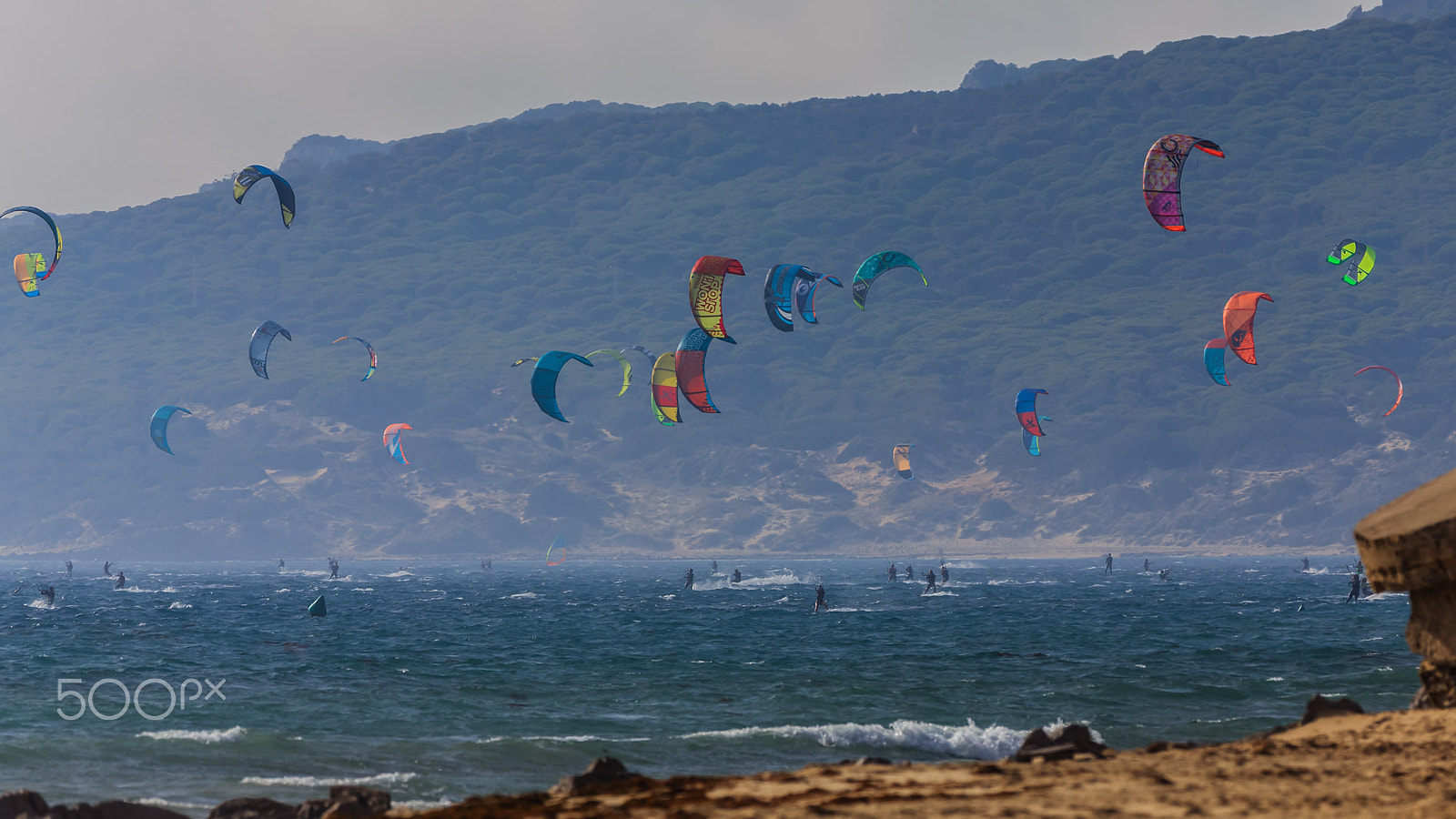 Canon EOS-1D X + Canon EF 300mm F2.8L IS USM sample photo. Kiters in tarifa, spain photography
