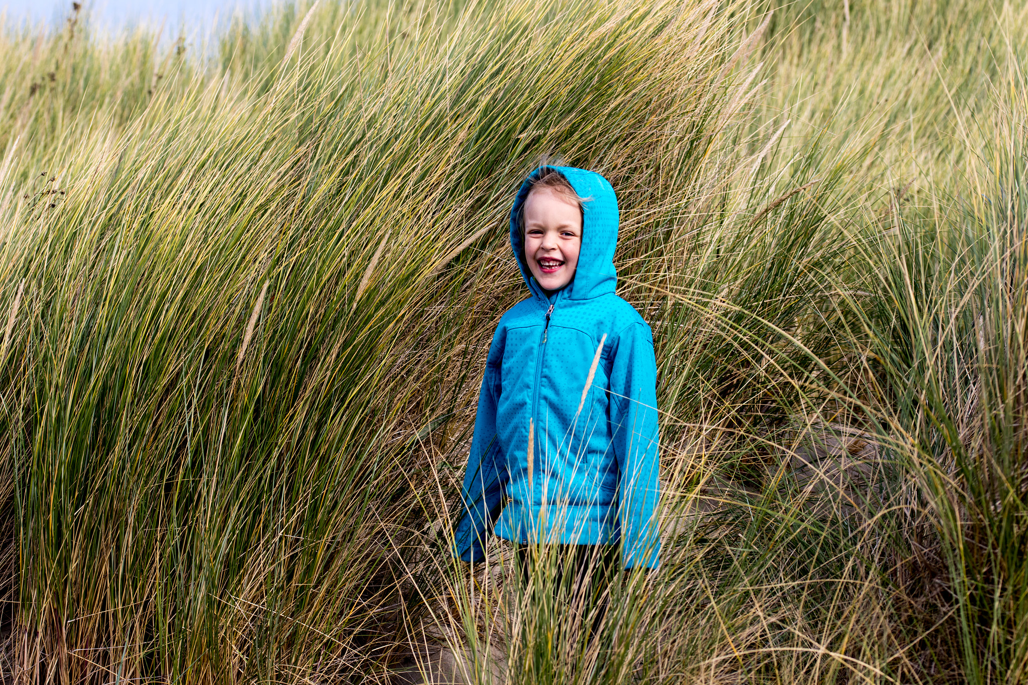 Sigma 105mm F2.8 EX DG OS HSM sample photo. Girl standing in gras photography