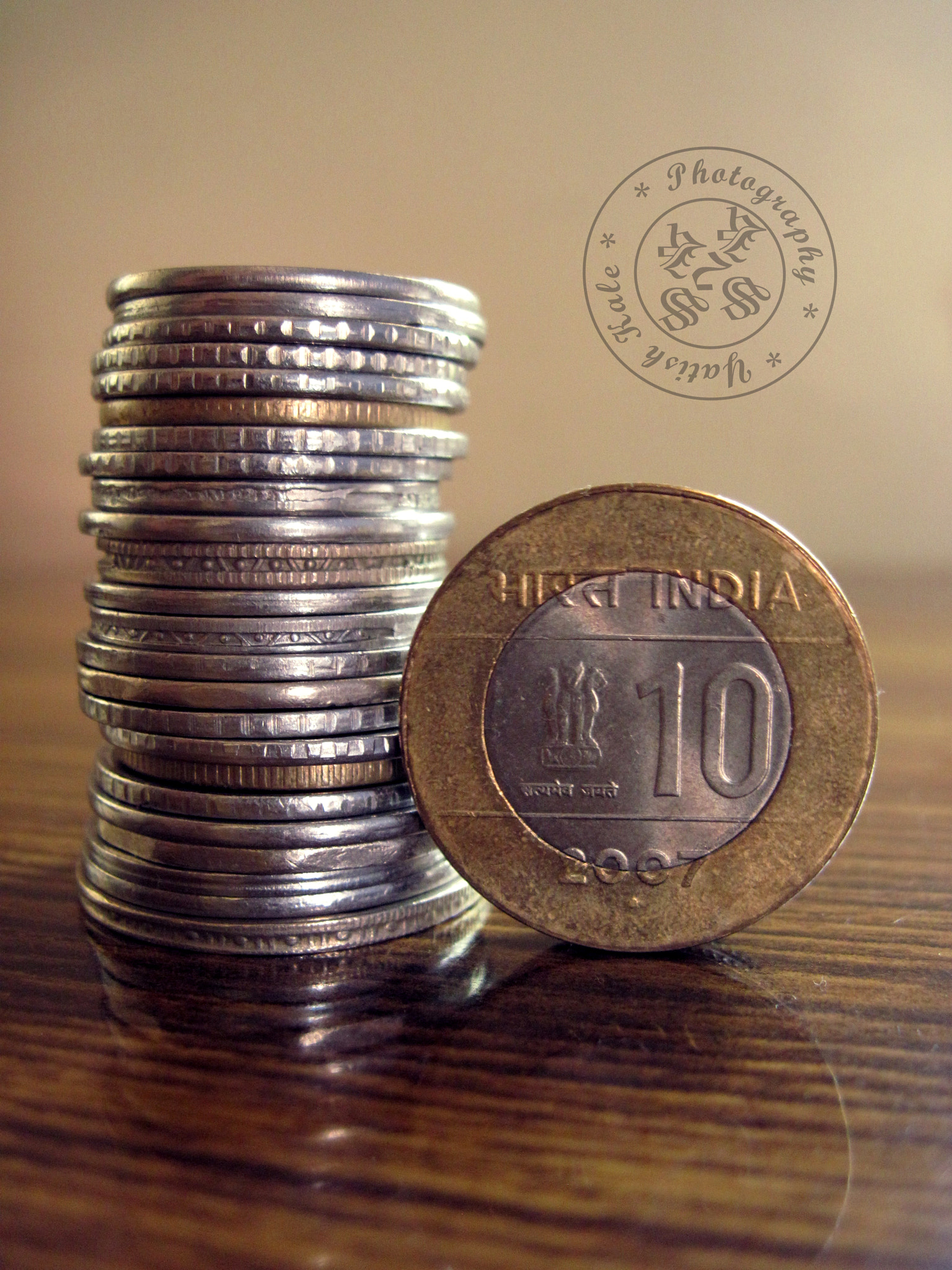 Canon PowerShot A1100 IS sample photo. Coins stack photography