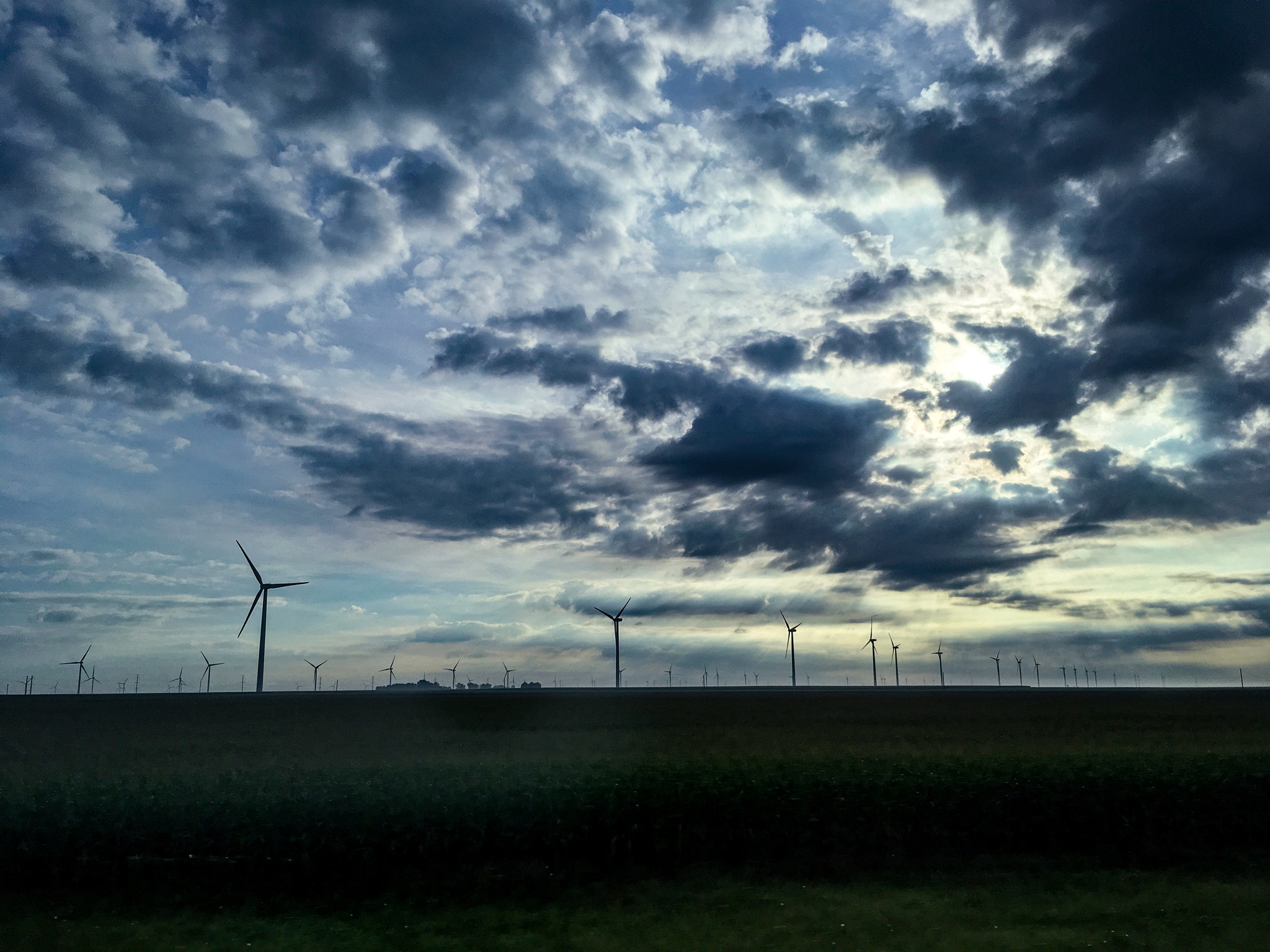 iPad Pro back camera 4.15mm f/2.2 sample photo. Wind turbines on a farm. photography