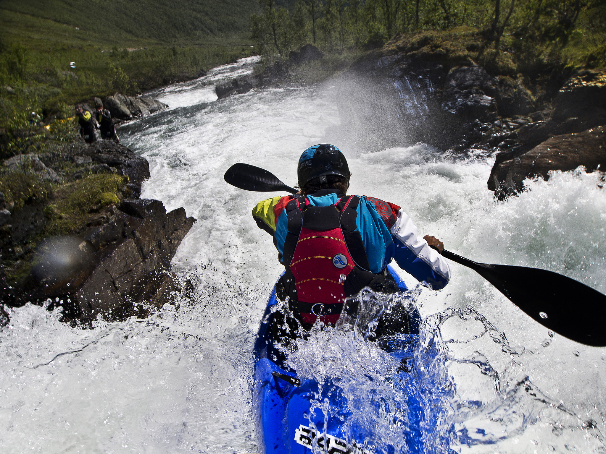 Olympus OM-D E-M5 + OLYMPUS M.9-18mm F4.0-5.6 sample photo. Whitewater kayaker jumps a waterfall photography