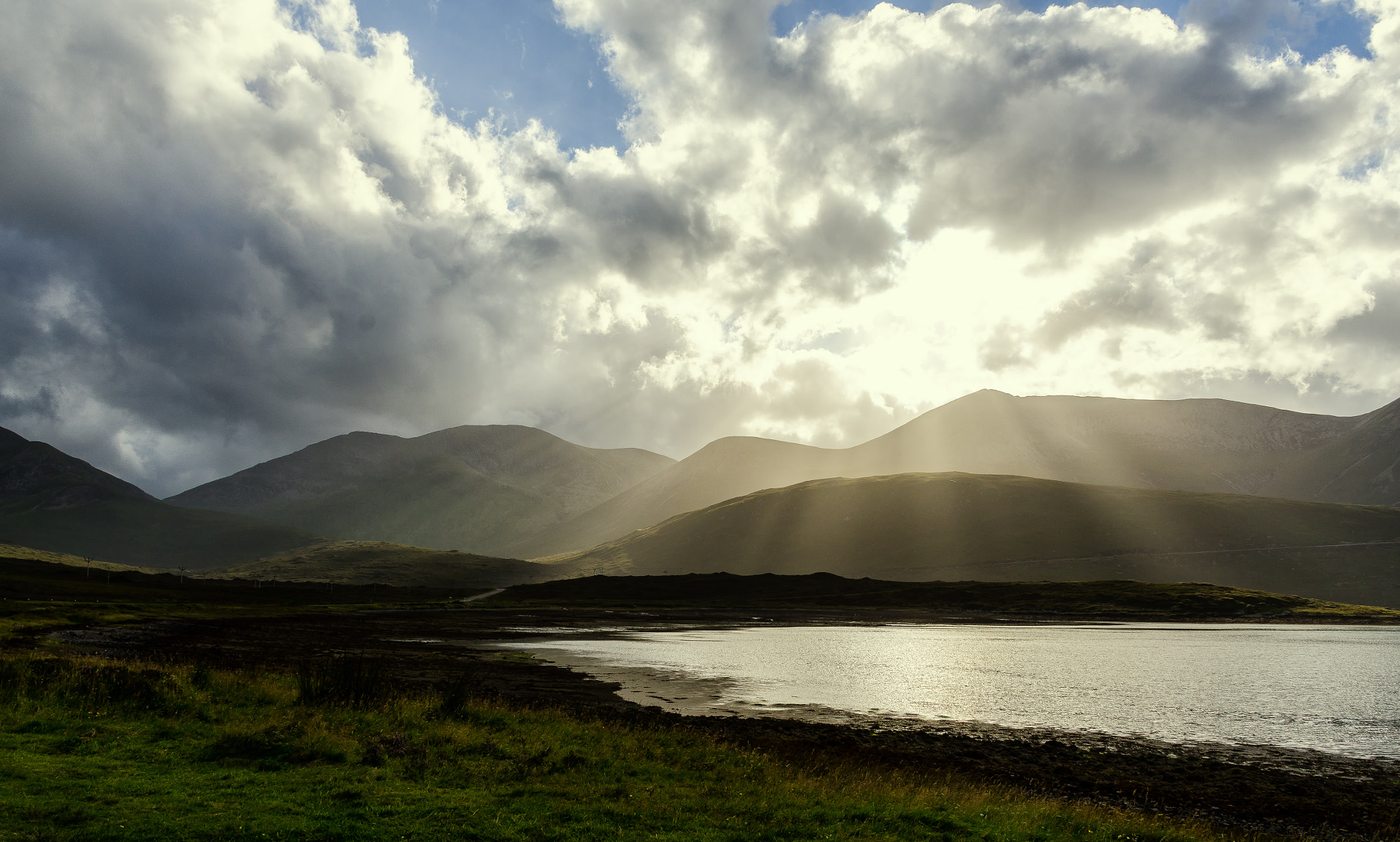 Nikon D7000 + Sigma 18-125mm F3.8-5.6 DC OS HSM sample photo. Sun settles over isle of skye photography