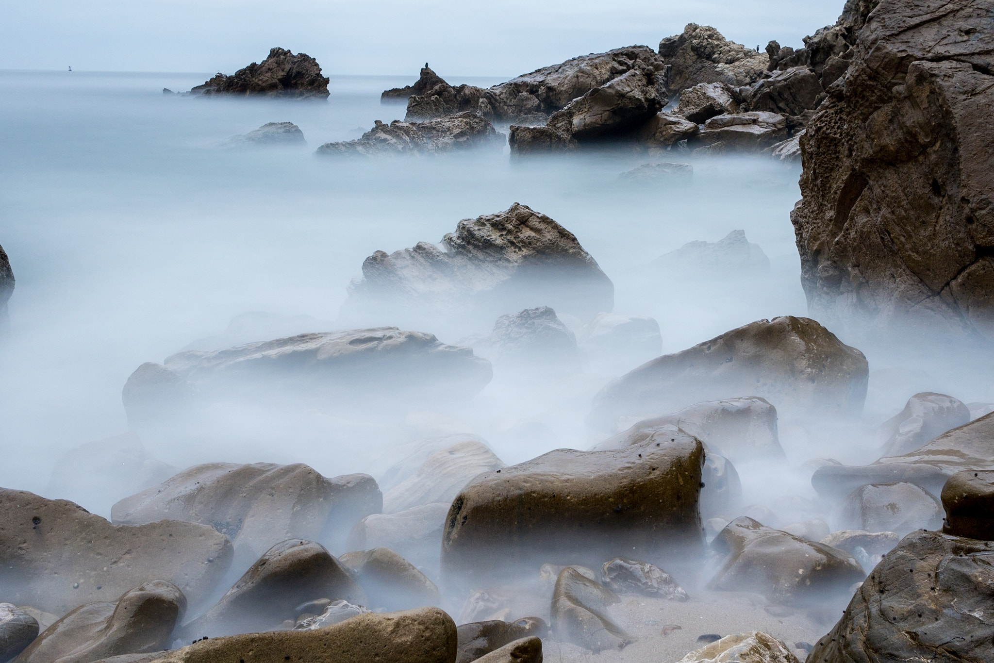 Canon EF-S 24mm F2.8 STM sample photo. Fog rocks photography