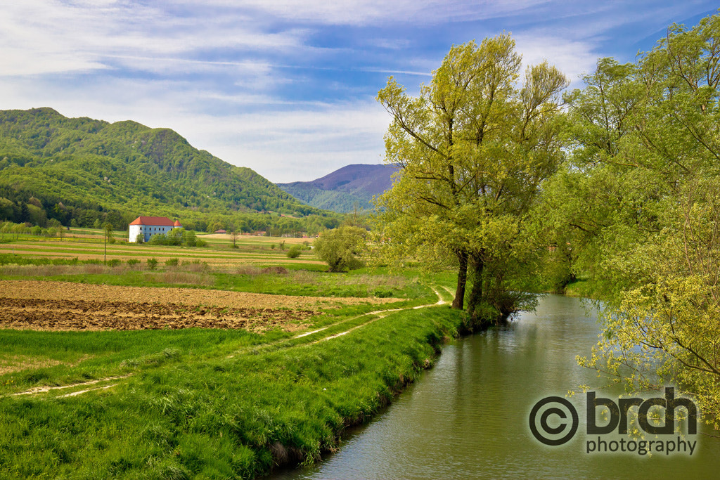 Canon EOS 550D (EOS Rebel T2i / EOS Kiss X4) + Canon EF 16-35mm F4L IS USM sample photo. Bednja river and bela castle springtime view photography