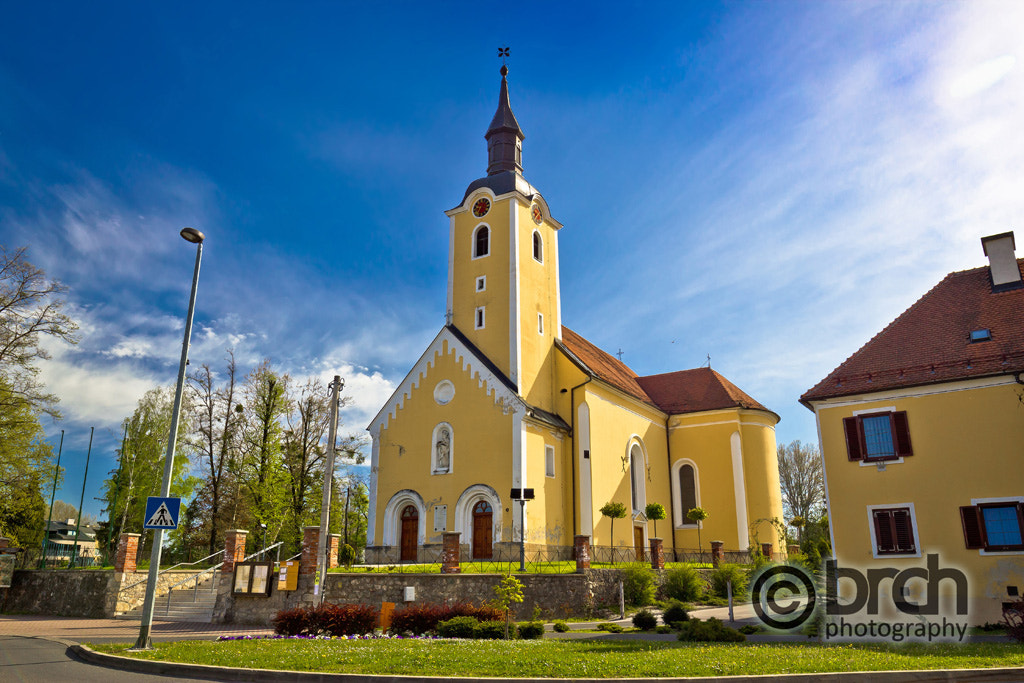 Canon EOS 550D (EOS Rebel T2i / EOS Kiss X4) + Canon EF 16-35mm F4L IS USM sample photo. Town of ivanec church view photography
