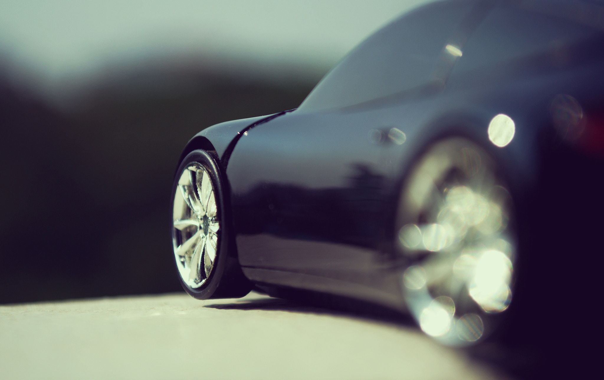 18.00 - 55.00 mm f/3.5 - 5.6 sample photo. Black car  in retro concept photography