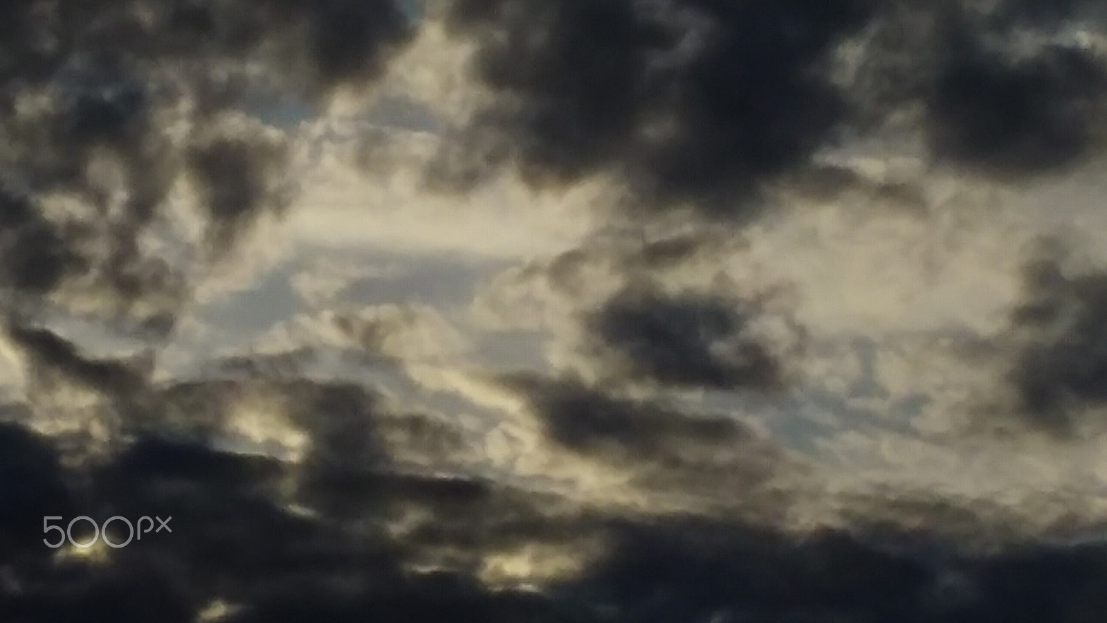 LG LEON 4G LTE sample photo. The face of the laughing cloud photography
