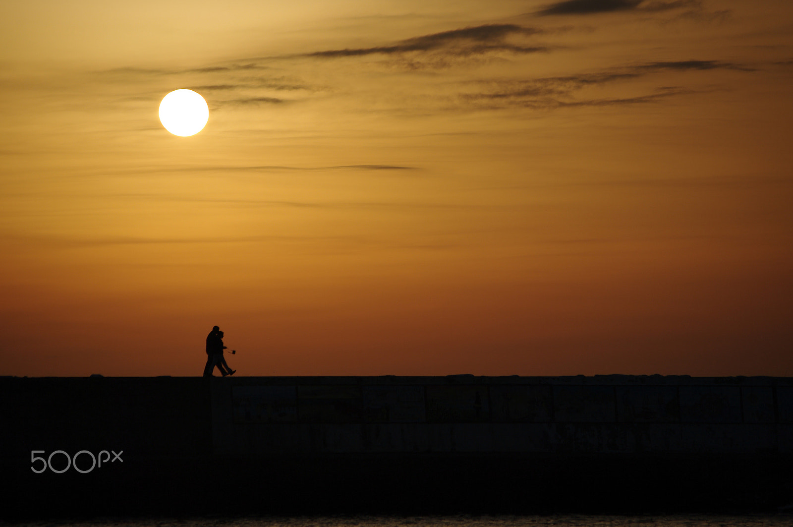 Pentax K20D + Pentax smc DA 50-200mm F4-5.6 ED sample photo. Walking on the sun photography