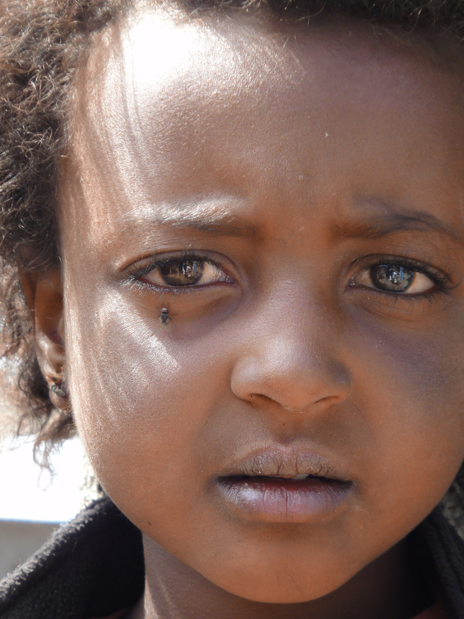 Sony DSC-TX7 sample photo. Ethiopia, dessie, village girl, little girl, poverty, soulful eyes, fly, pensive face, yearning,... photography