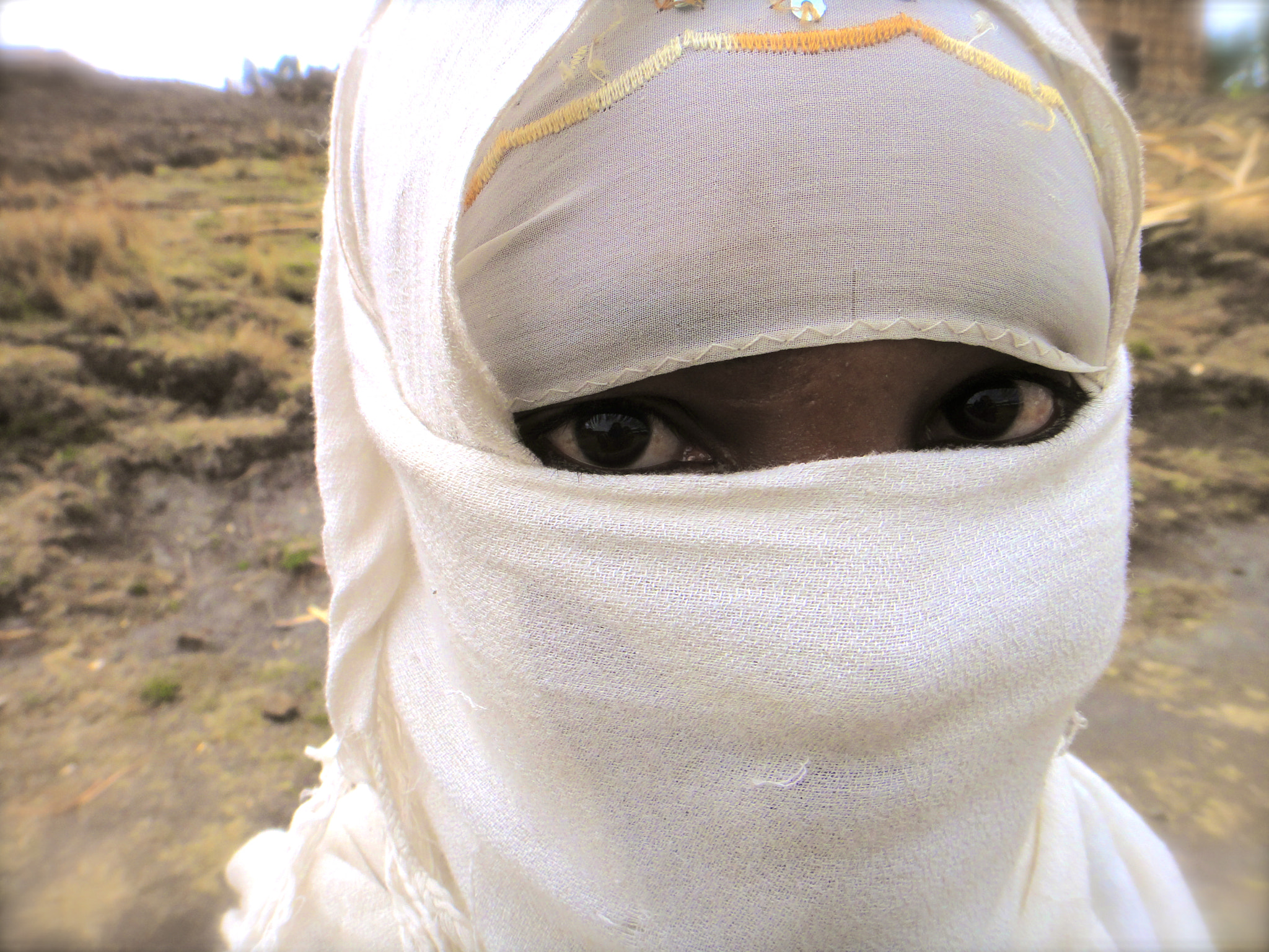 Sony DSC-TX7 sample photo. Ethiopia, muslim woman, beautiful eyes, face covered, big eyes, white head scarf, soulful, eyes only photography