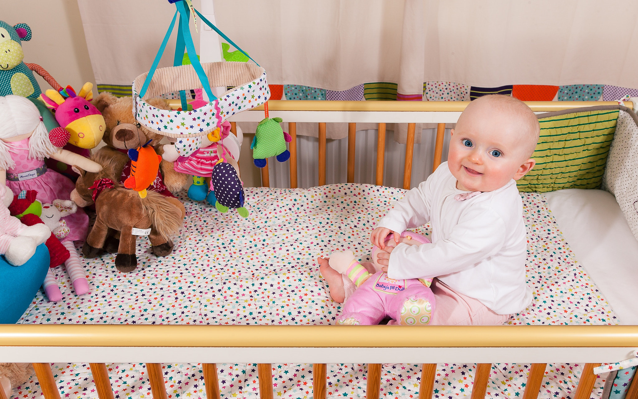 Canon EOS-1Ds Mark III + Canon EF 17-40mm F4L USM sample photo. Evie in her crib photography