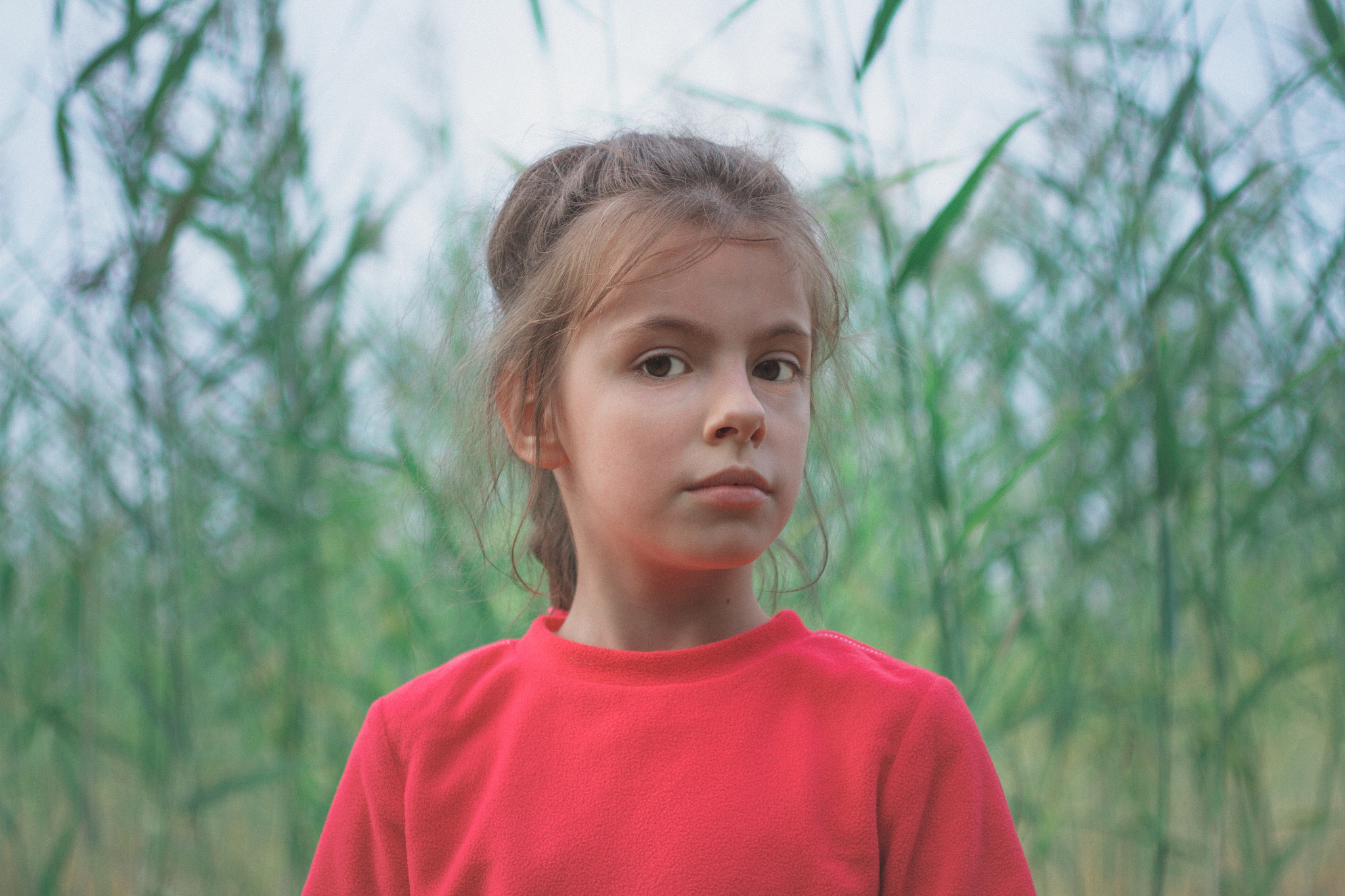 Canon EF 50mm F2.5 Macro sample photo. Girl in a red hoodie. photography