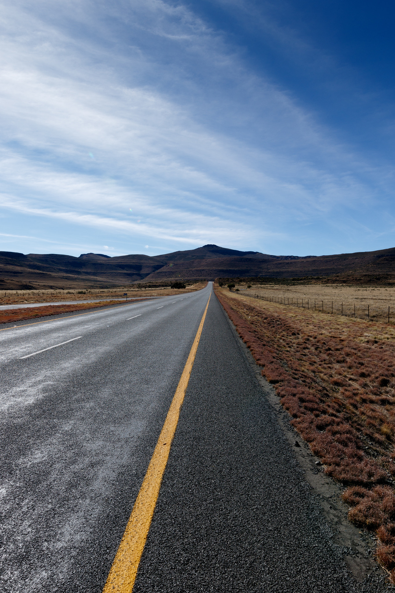 Canon EOS 7D Mark II + Canon EF 300mm f/2.8L sample photo. The road leading to the mountains in graaff-reinet photography