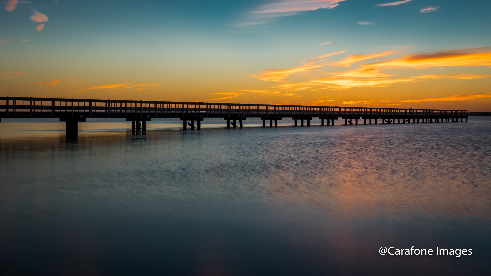Canon EOS 7D Mark II + Canon EF 16-35mm F4L IS USM sample photo. Sunset at the pier photography