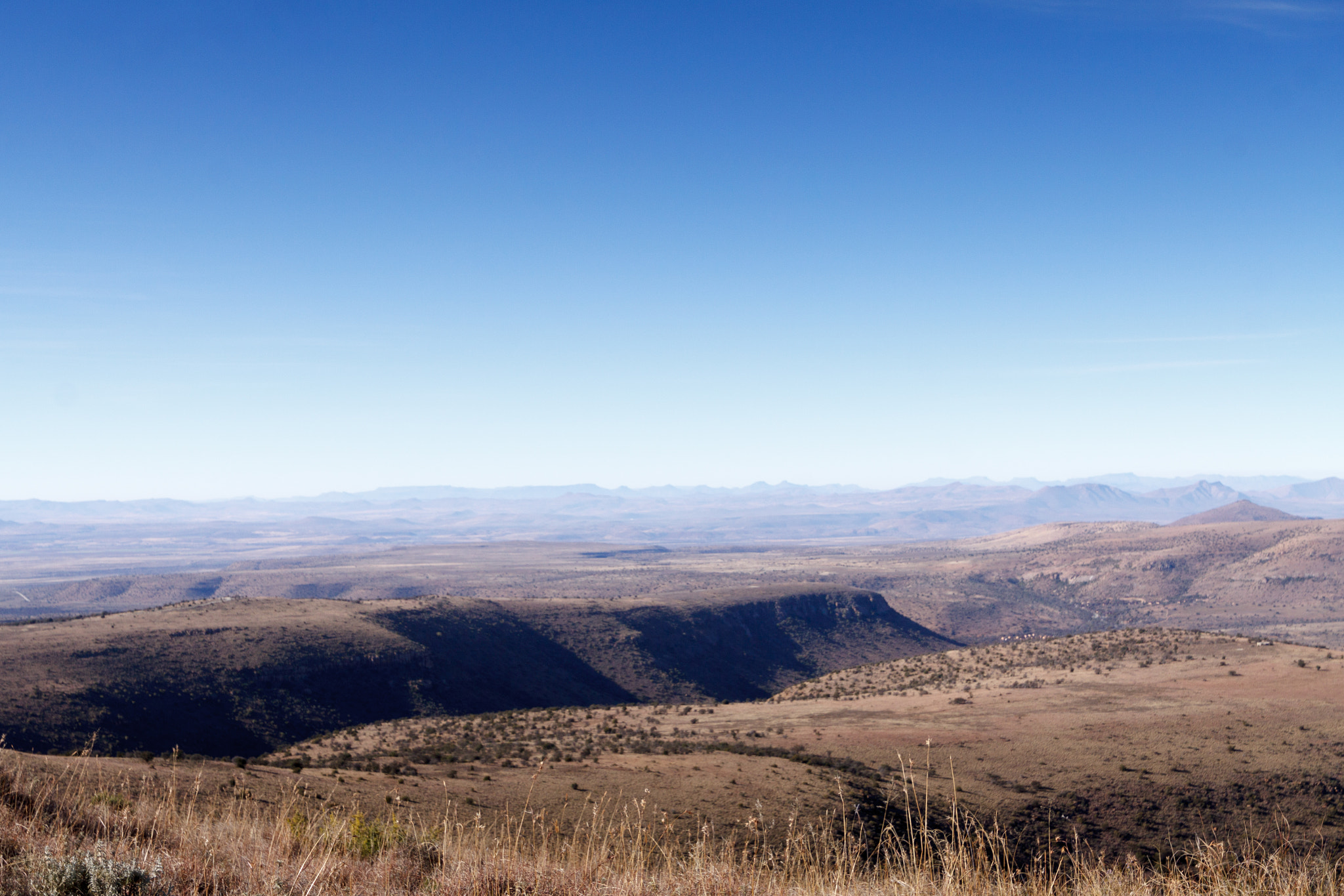 Canon EOS 50D + Canon EF 300mm f/2.8L sample photo. Beautiful green valley with mountains photography