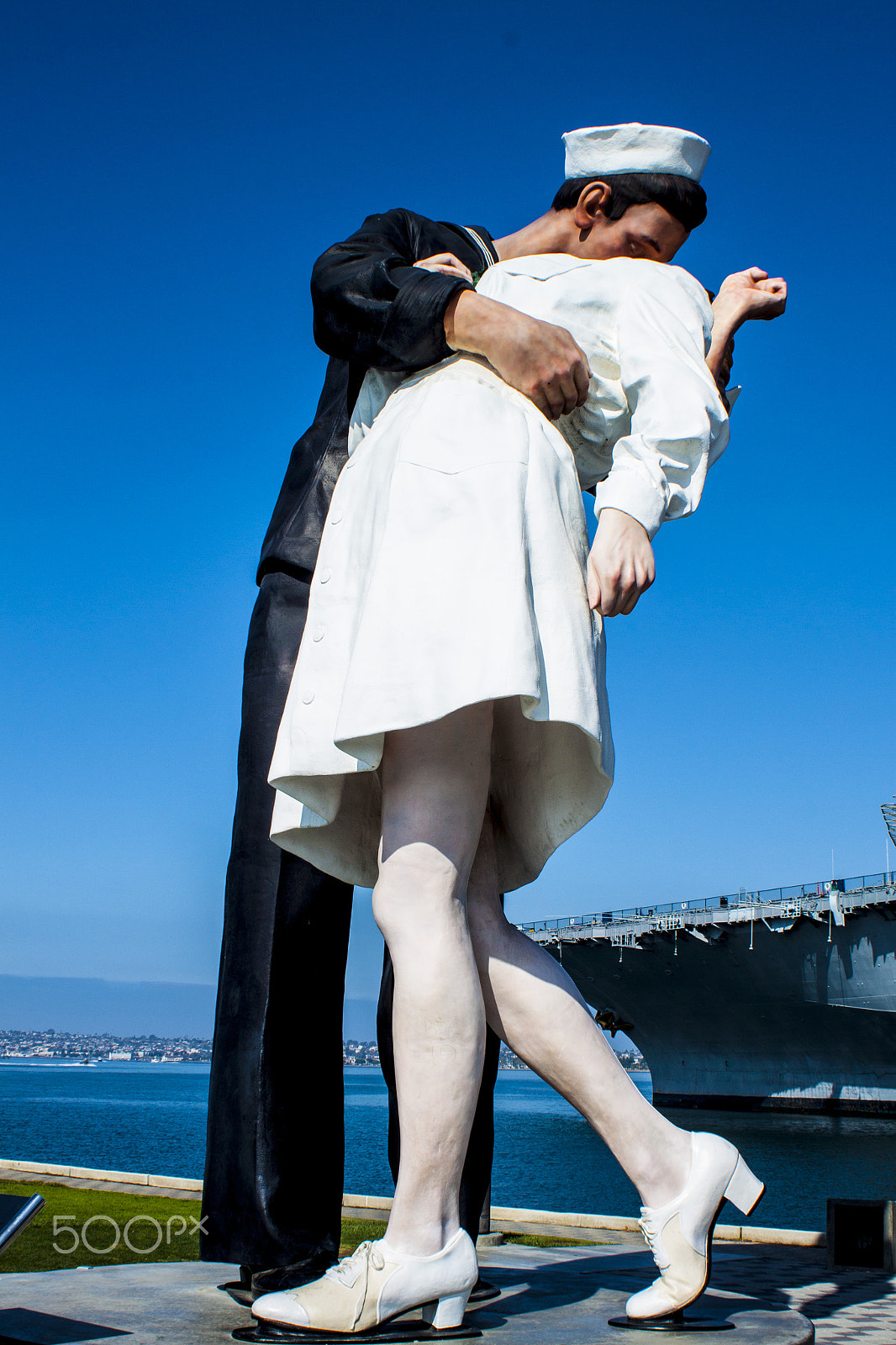 Canon EOS 500D (EOS Rebel T1i / EOS Kiss X3) + Canon EF 28-80mm f/3.5-5.6 sample photo. Sailor kissing girl photography