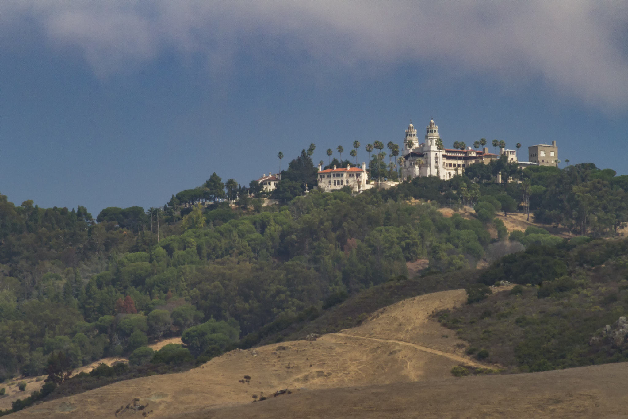 Canon EOS 7D + Canon EF 75-300mm F4.0-5.6 IS USM sample photo. House on the hill photography