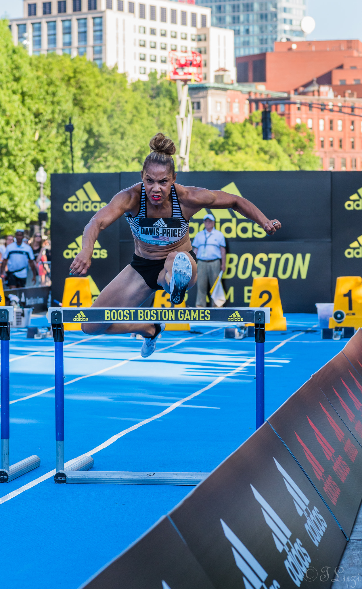 Nikon D750 + Tokina AT-X Pro 100mm F2.8 Macro sample photo. Boost boston 100m women's hurdles photography