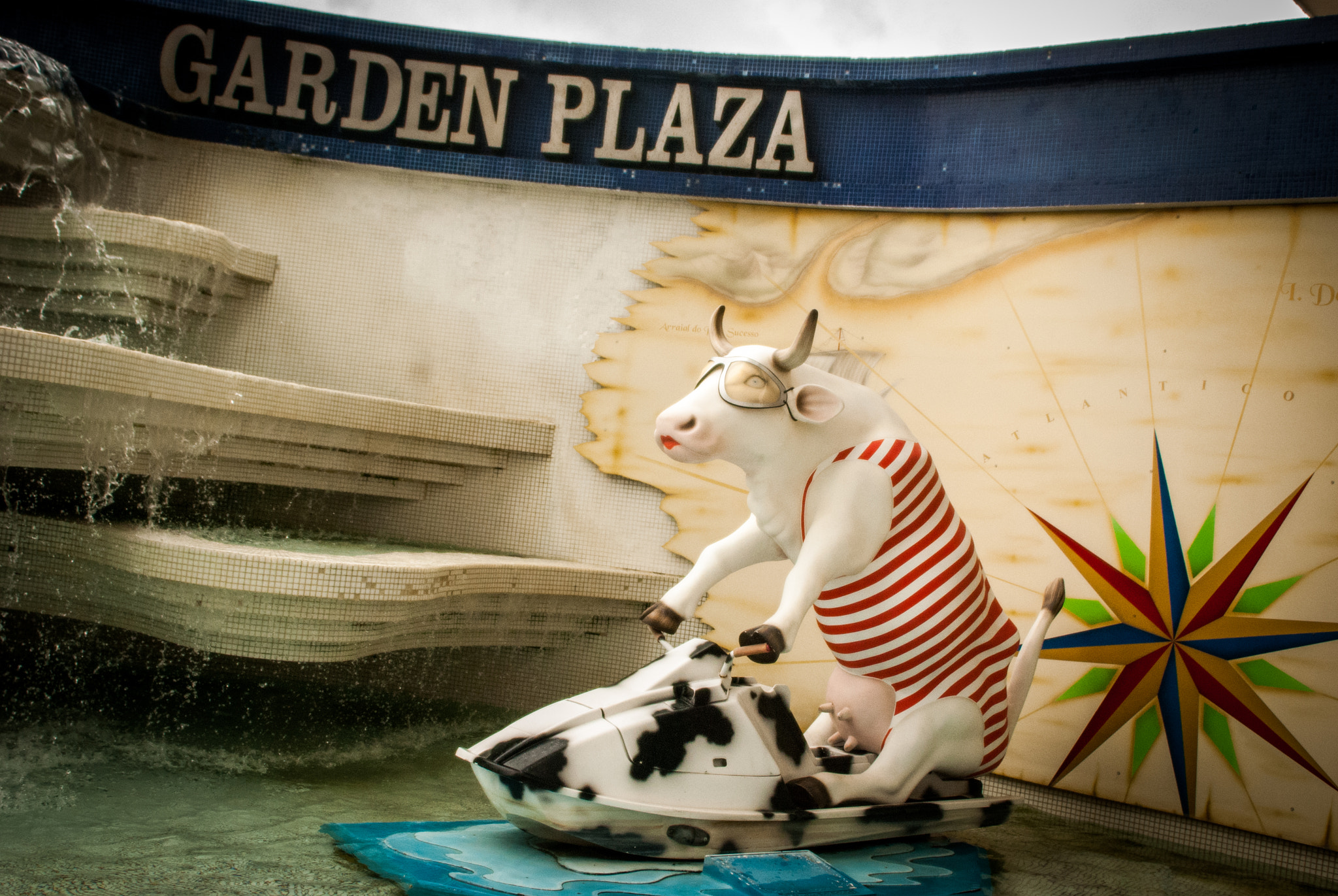 Nikon D80 + Sigma 24-70mm F2.8 EX DG Macro sample photo. Cow on a jet ski photography