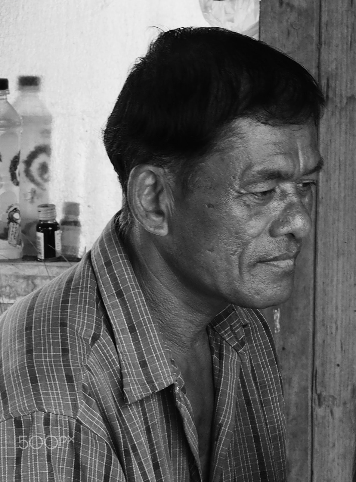 Olympus OM-D E-M5 + Olympus M.Zuiko Digital ED 75mm F1.8 sample photo. Thai farmer portrait photography
