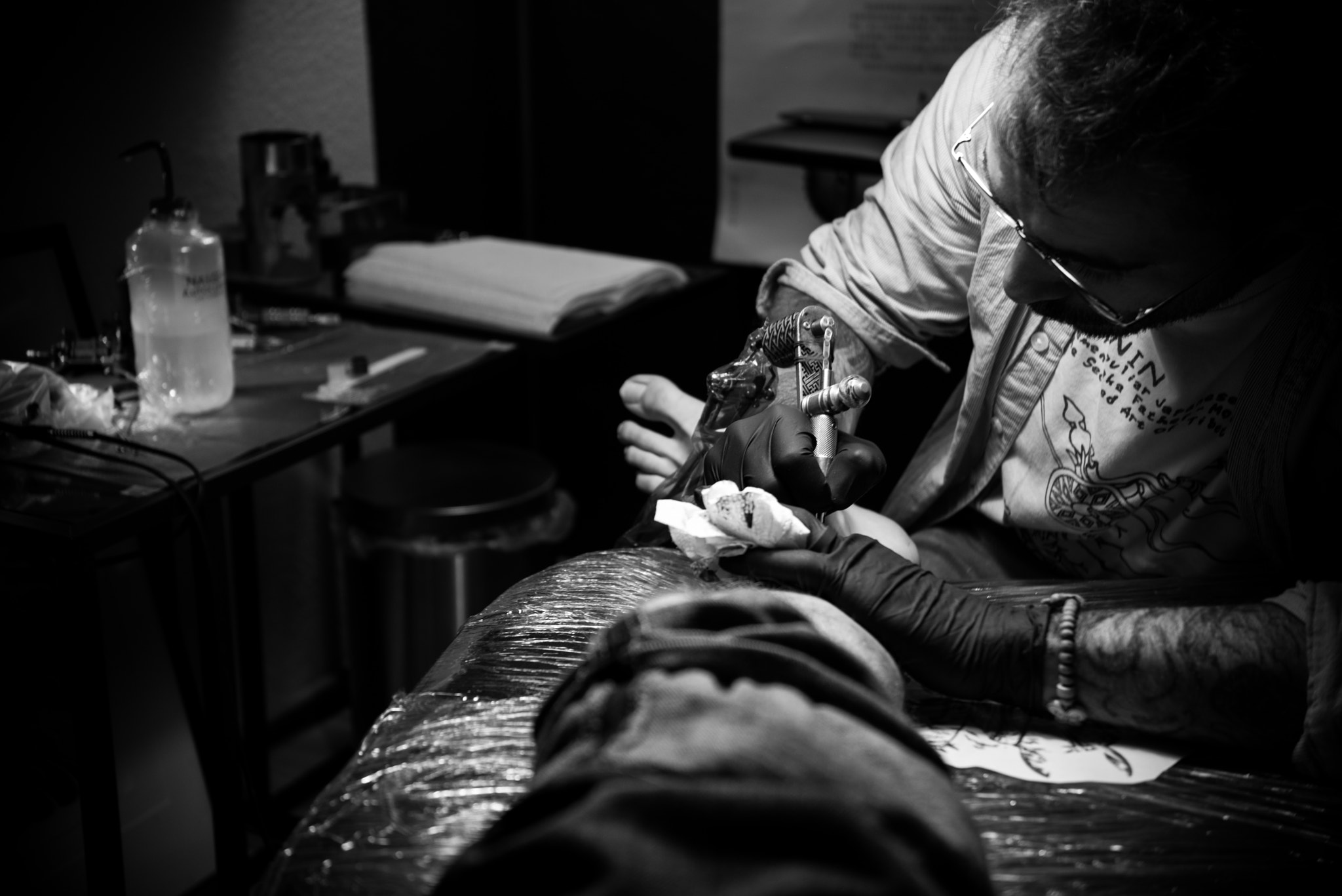 Sigma 70-200mm F2.8 EX DG Macro HSM II sample photo. Tattoo artist at work photography