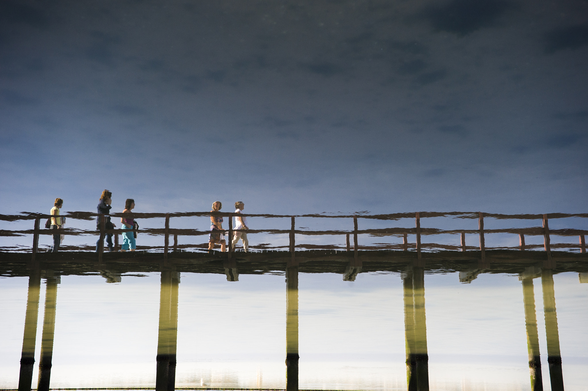 Nikon D3 sample photo. Reflected humans photography