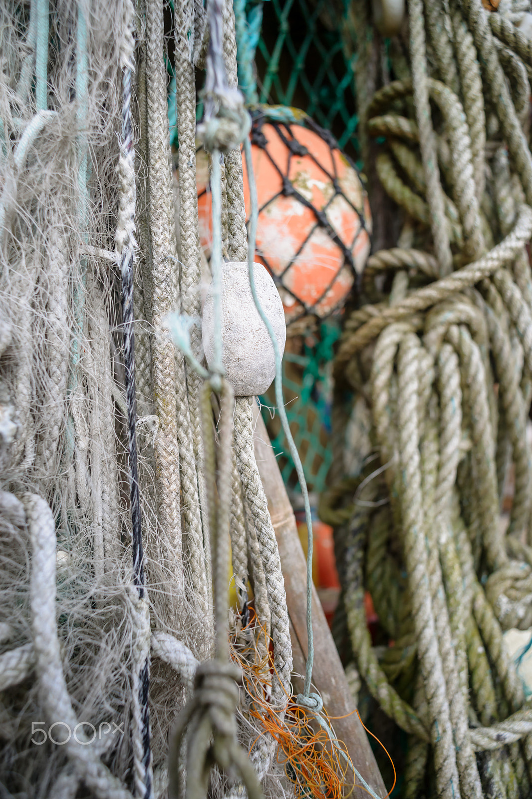 Sony 28mm F2.8 sample photo. Nautical background. closeup of old colorful mooring ropes , old photography
