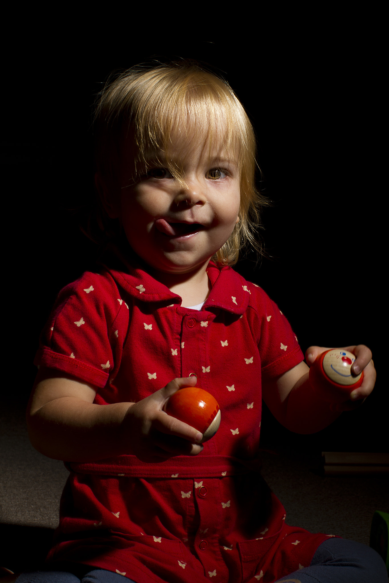 Canon EOS 7D + Canon EF 50mm F1.2L USM sample photo. Olivia playing with balls photography